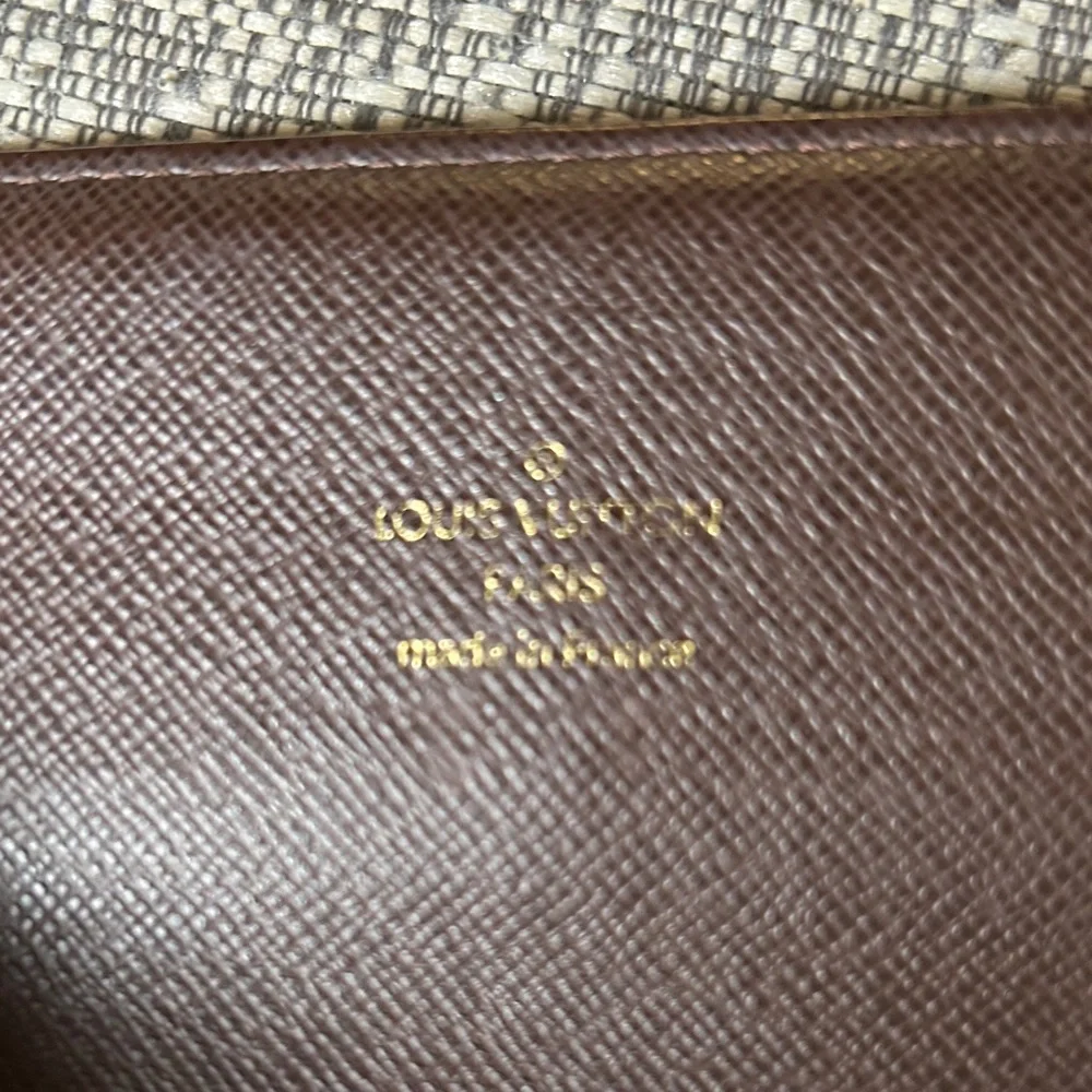 377.  Louis Vuitton Mini Lin Sarah Wallet w/COA